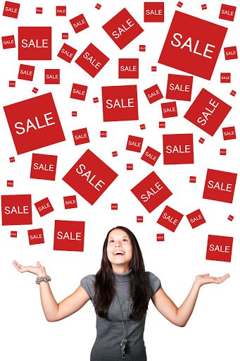 Description: Sales | Free Stock Photo | A beautiful girl enjoying sales signs ...